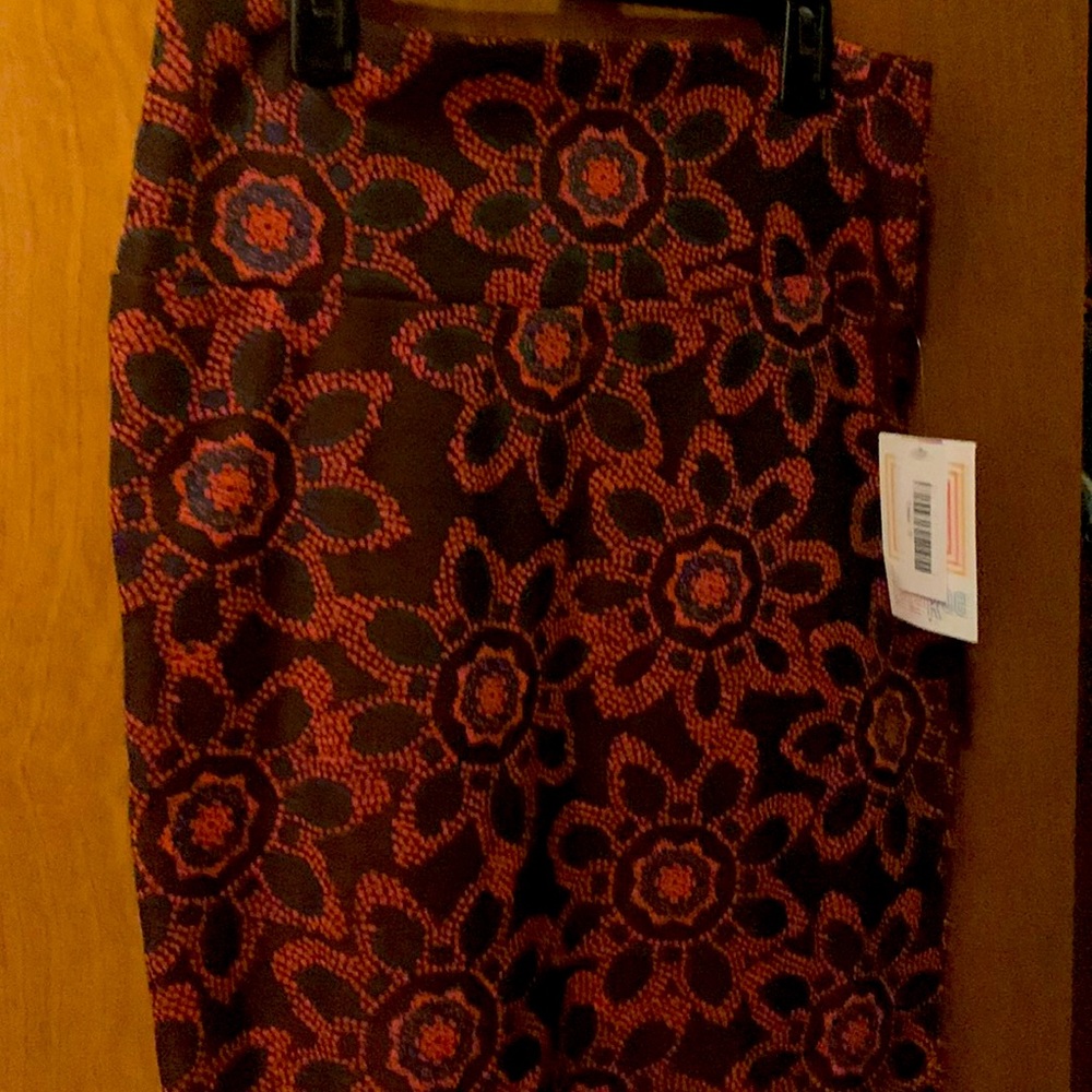 LuLaRoe Cassie brown background never been worn